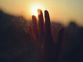 hand and sun
